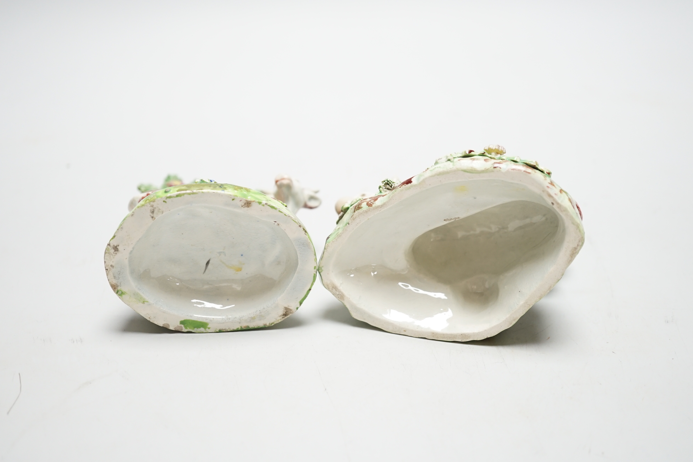 Two Staffordshire pearlware cow groups, c.1820-30, tallest 12cm